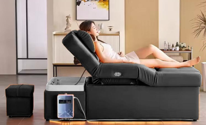 Head spa bed with stainless steel base and adjustable backrest, integrated shampoo sink.png